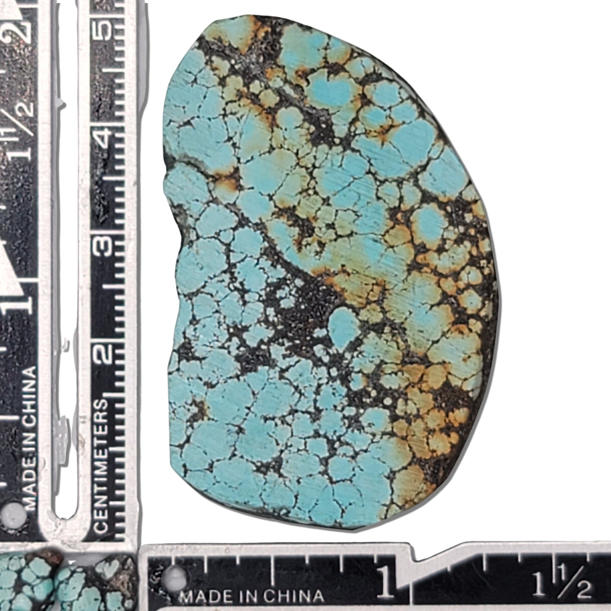 An 18-gram turquoise rough stone featuring vibrant blue color with golden and black matrix patterns. Perfect for jewelry making or lapidary work, available at www.naturalturquoise.com.