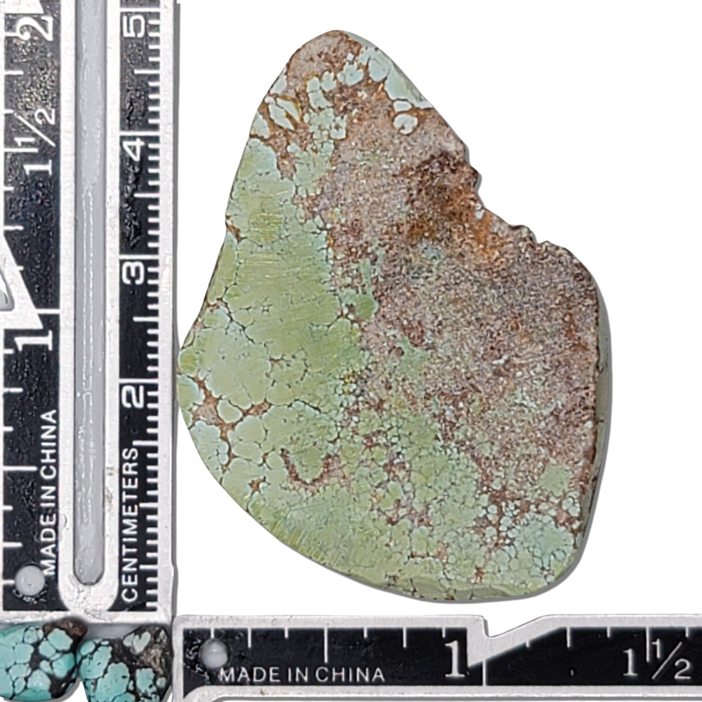 Single rough turquoise stone with soft green hues and an earthy matrix, approx. 5 cm x 4 cm, www.naturalturquoise.com.