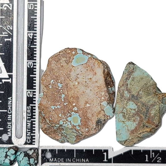 Two rough turquoise stones with light blue spots and earthy brown matrix, approx. 3 cm x 2.5 cm and 2.5 cm x 2 cm, www.naturalturquoise.com