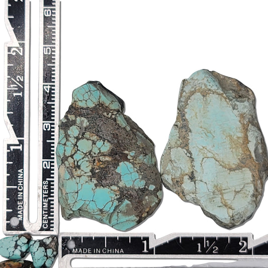 Two rough turquoise stones with light blue hues and natural earthy matrix, approx. 4 cm x 3 cm and 3.5 cm x 2.5 cm, www.naturalturquoise.com."