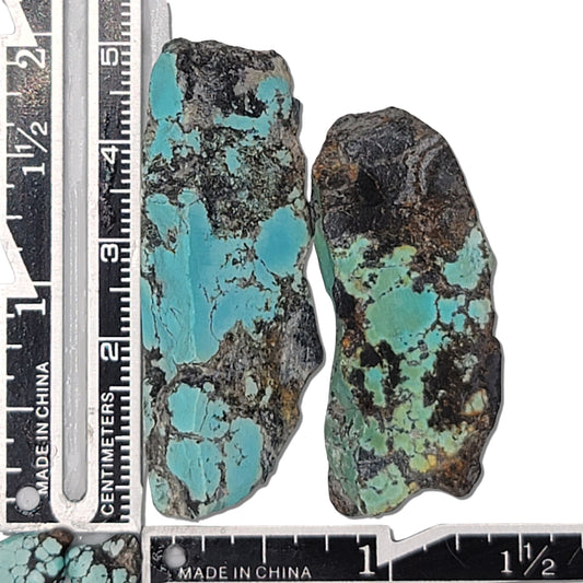 Two rough turquoise stones with blue and green hues and dark matrix, approx. 5 cm x 2 cm and 4.5 cm x 2 cm, www.naturalturquoise.com