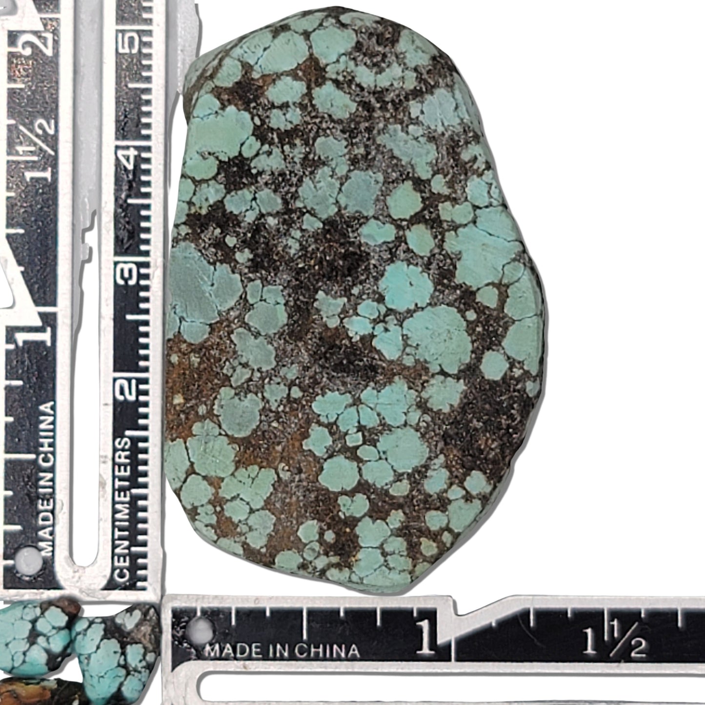 Single rough turquoise stone, 28g, with brown and green hues and dark matrix, approx. 3.5 cm x 2.5 cm, www.naturalturquoise.com