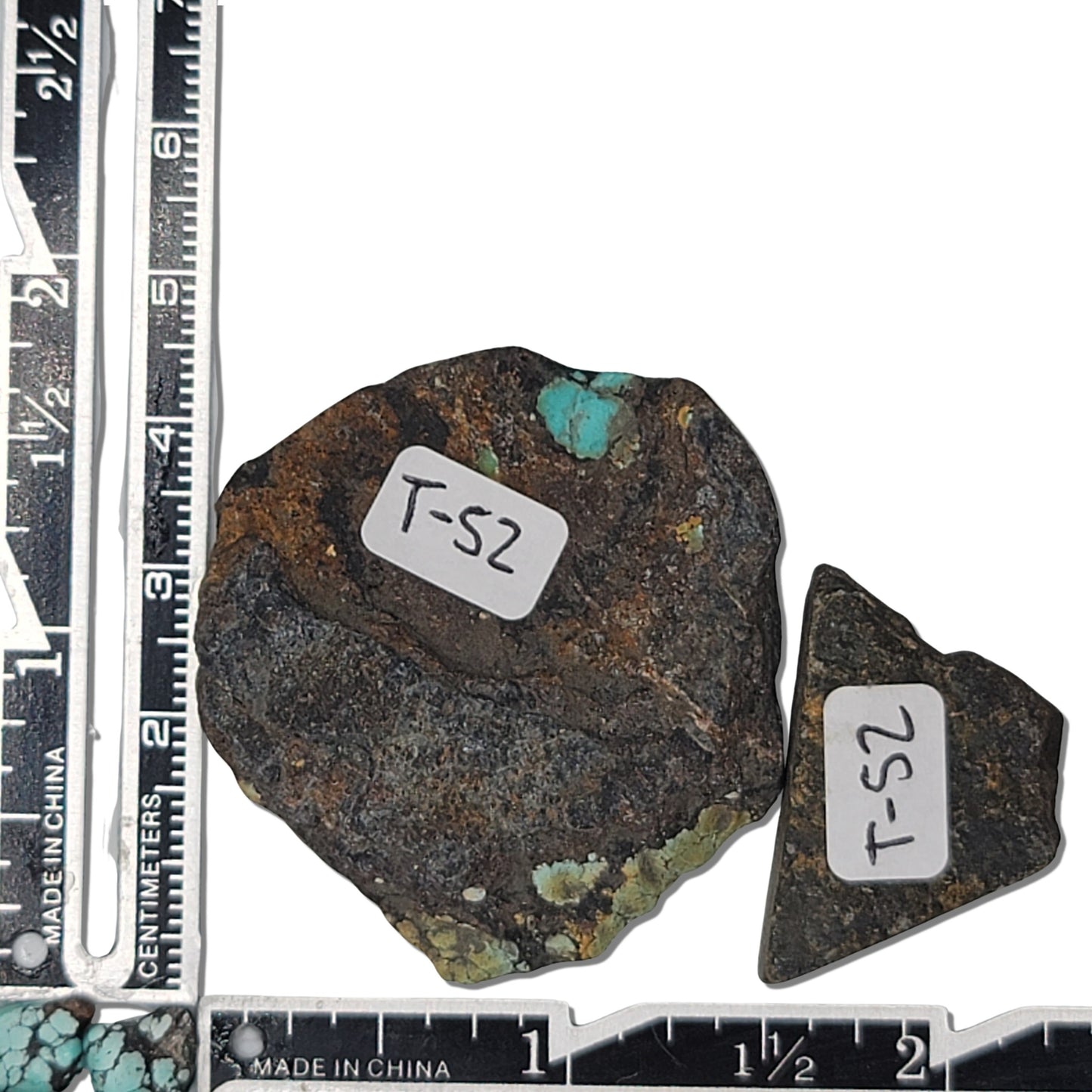 Pair of natural Hubei turquoise stones, 24g total, green and brown hues with black matrix, larger stone approx. 4.5 cm x 4 cm, smaller approx. 2.5 cm x 2 cm