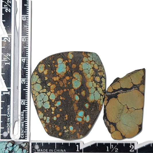 Two rough turquoise stones with vibrant blue and earthy orange matrix patterns, approx. 4 cm x 3.5 cm and 2.5 cm x 2 cm, www.naturalturquoise.com