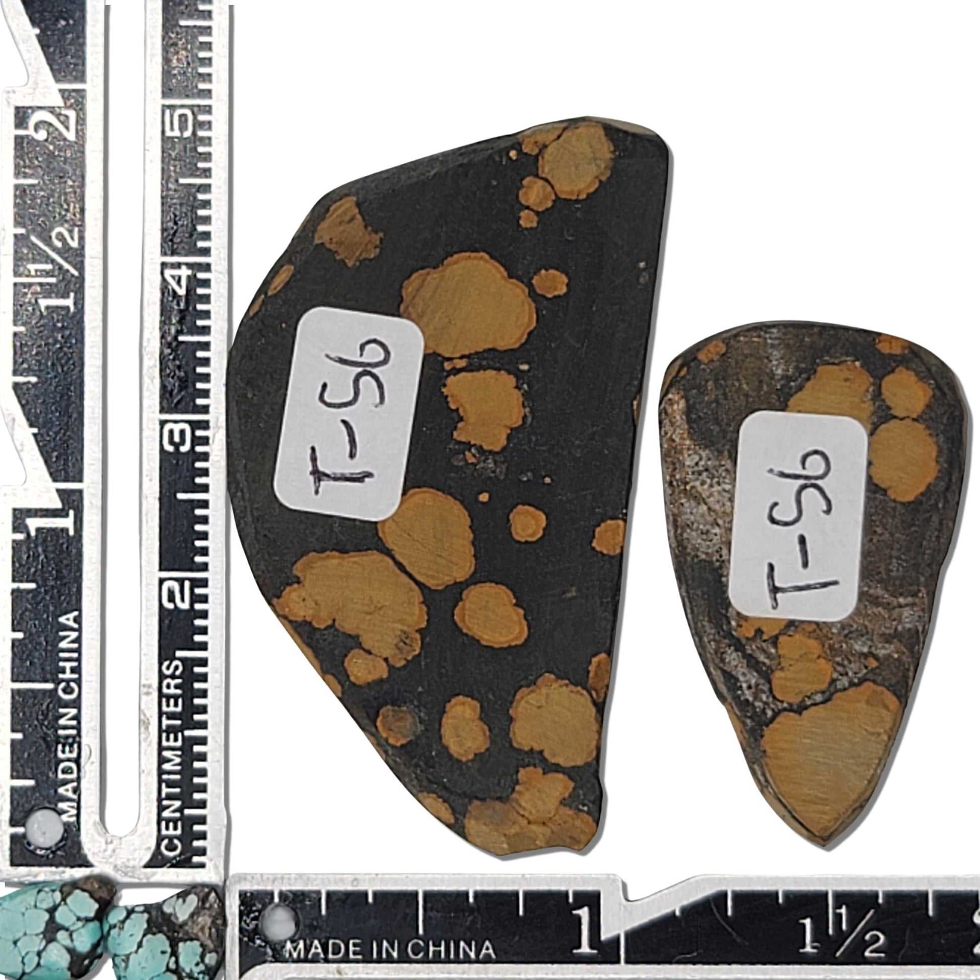 Pair of Hubei turquoise stones, 20g total, tan and golden patterns on dark matrix, unique shapes, approx. 4 cm x 2.5 cm and 3 cm x 1.5 cm, www.naturalturquoise.com.