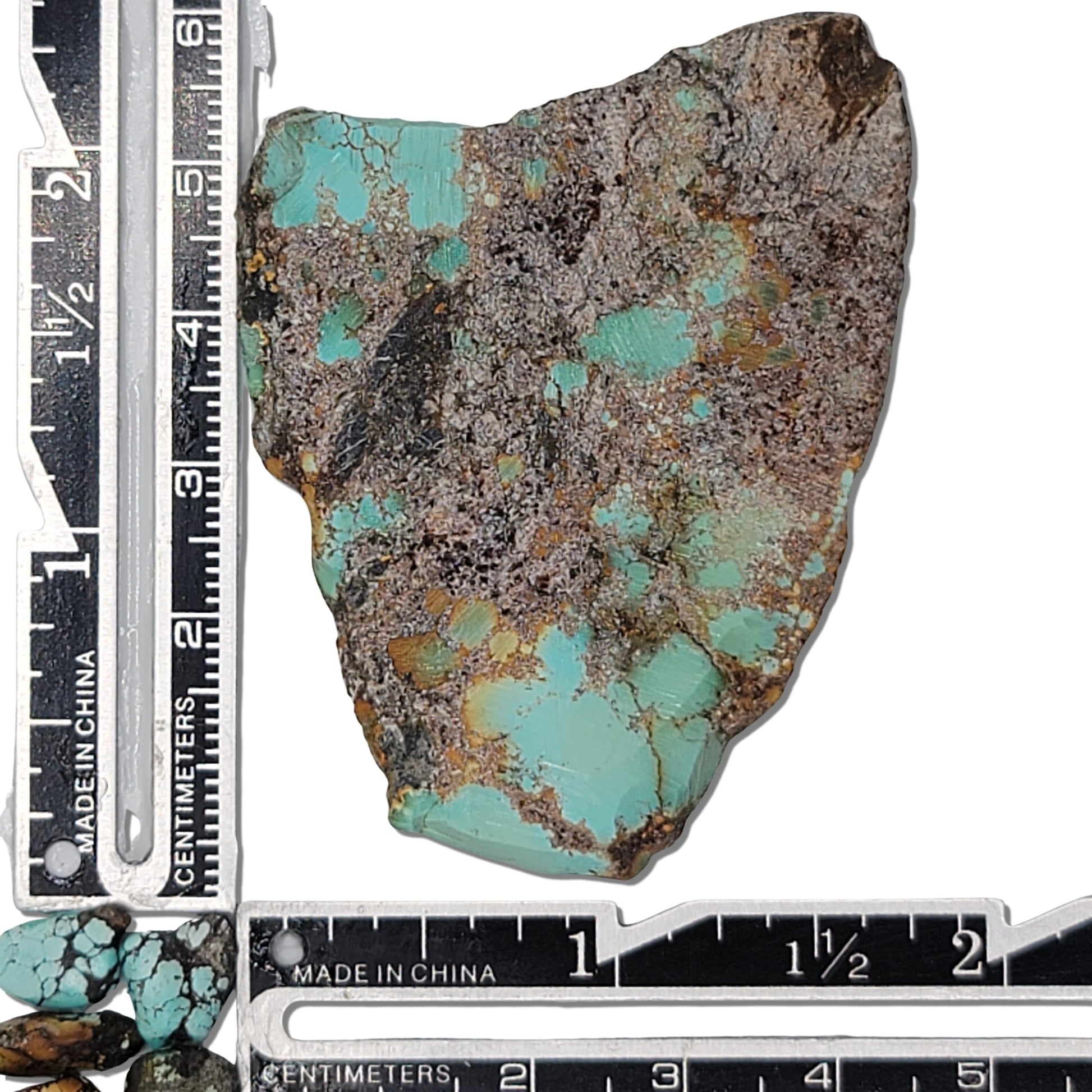 Single rough turquoise stone with vibrant blue and earthy brown matrix, approx. 4.5 cm x 4 cm, www.naturalturquoise.com.