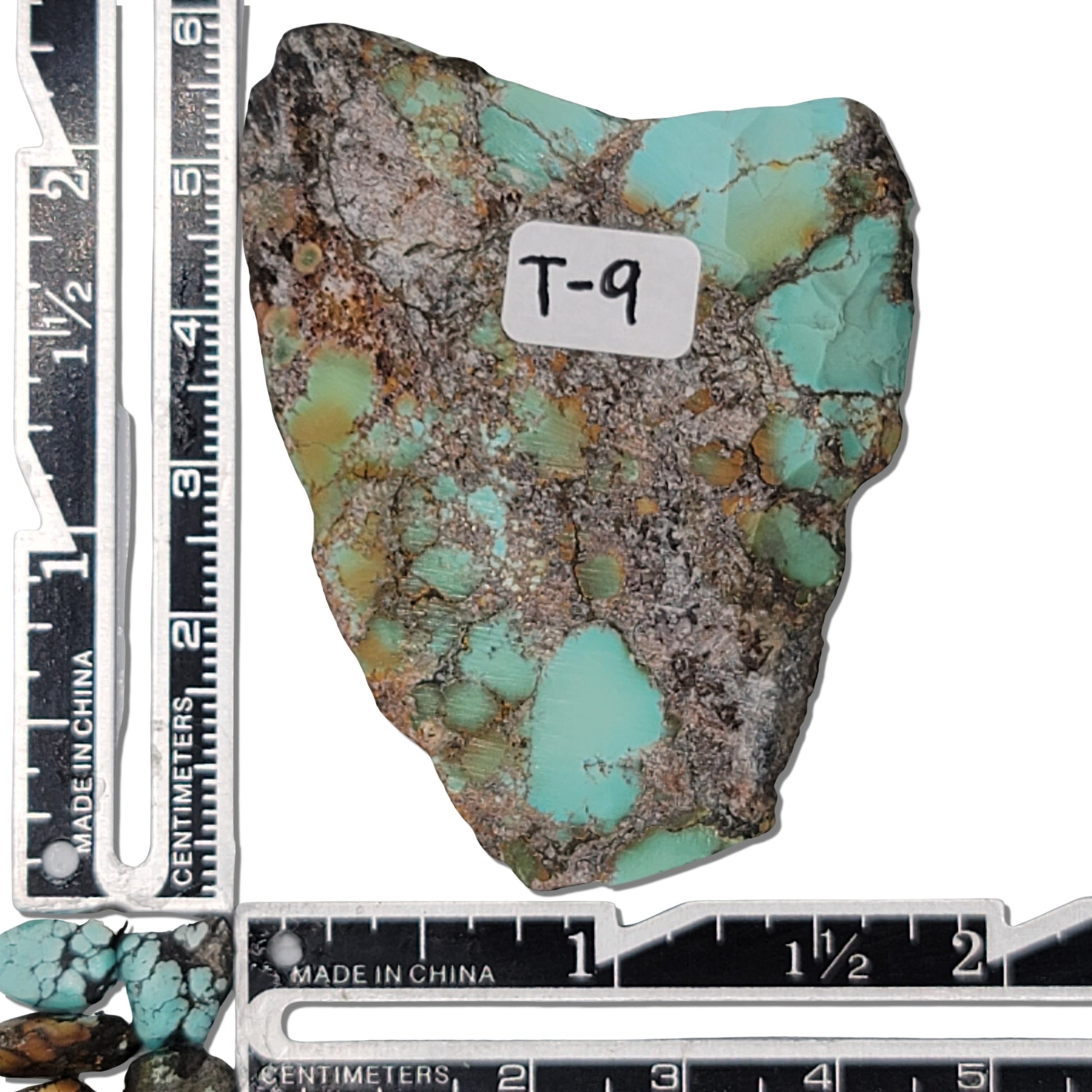 Single rough turquoise stone with vibrant blue and earthy brown matrix, approx. 4.5 cm x 4 cm, www.naturalturquoise.com.